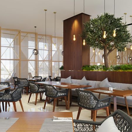 Maani Muscat Hotel & Suites Экстерьер фото
